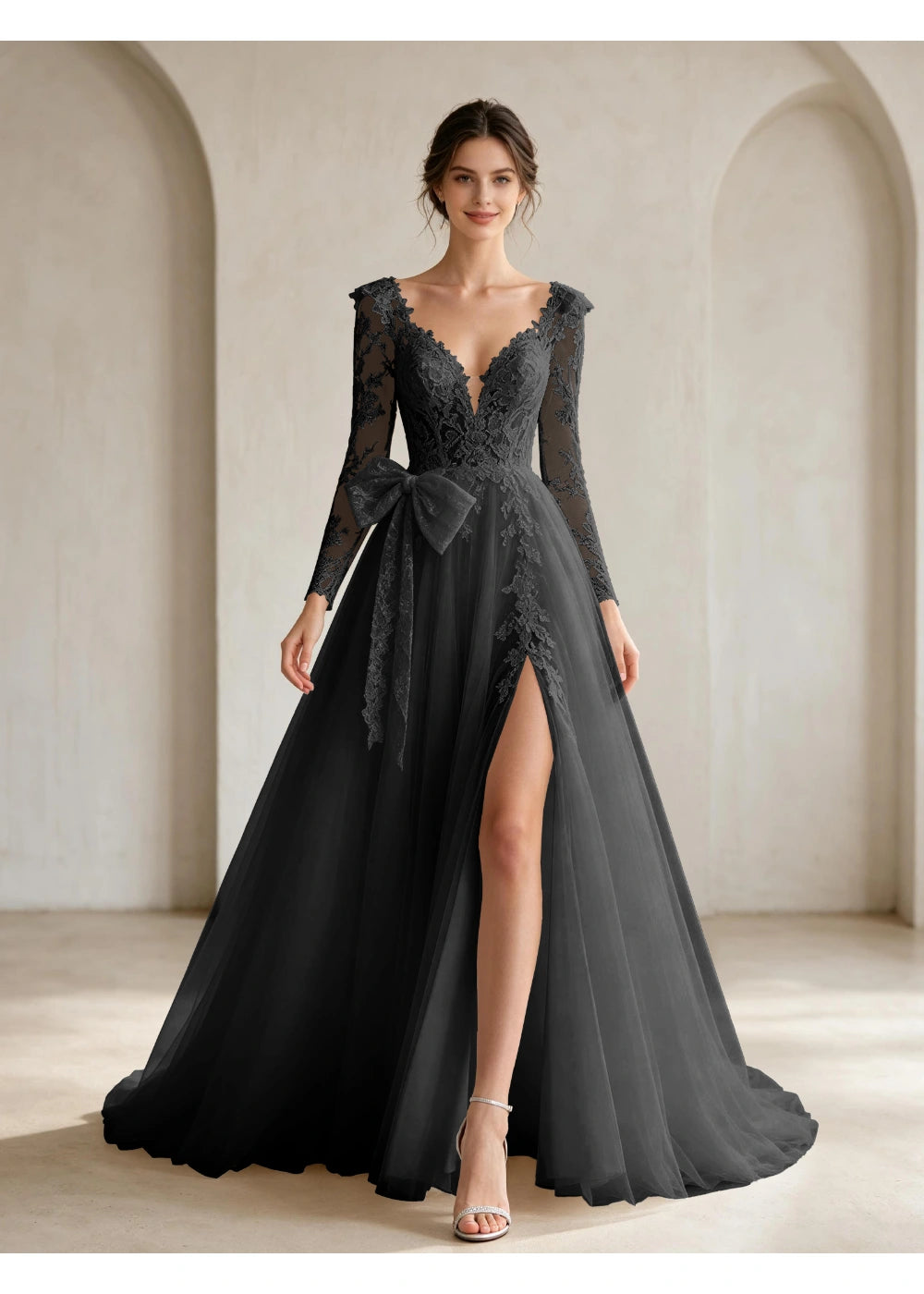 Front view of the black lace front bow slit gown with the same bridal silhouette