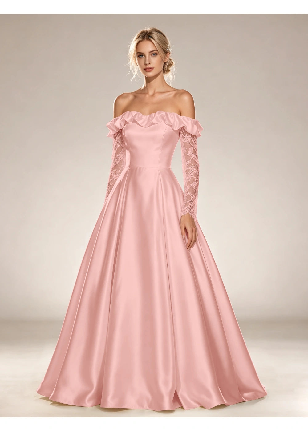 Front view of the blush pink ruffled off shoulder gown with the same bridal silhouette