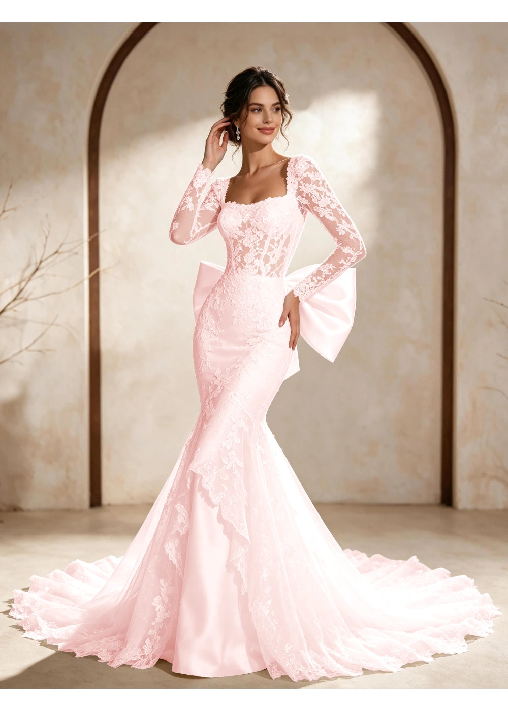 Front view of the blush pink square neck back bow gown with the same bridal silhouette