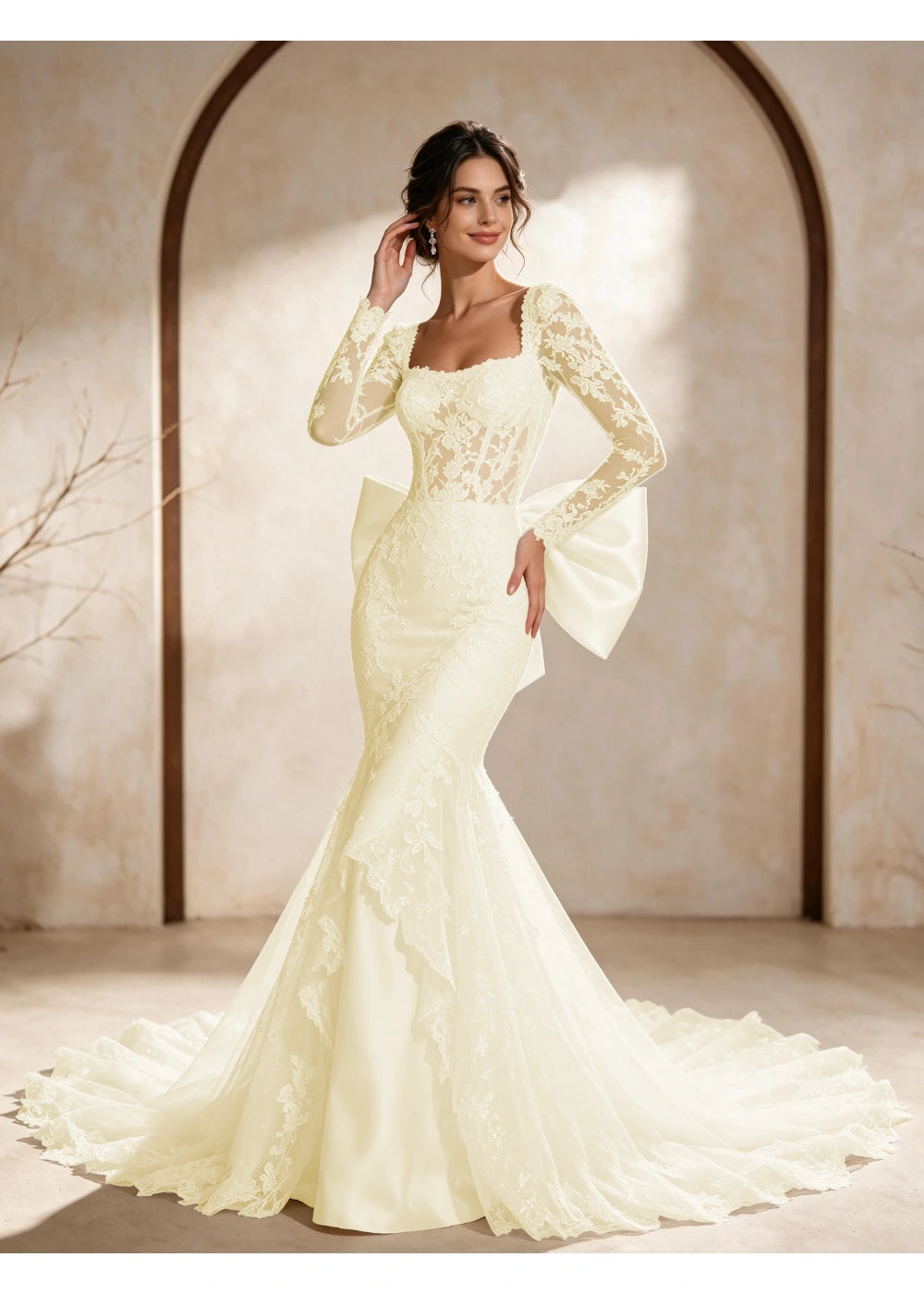 Front view of the champagne square neck back bow gown with the same bridal silhouette