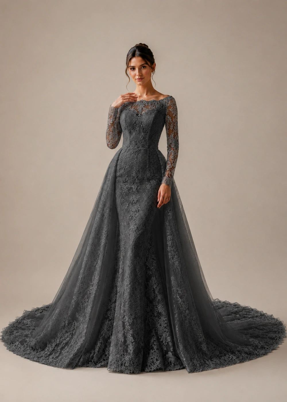 Front view of the charcoal gray illusion-neck A-line gown with all-over floral lace, long sleeves, and a train