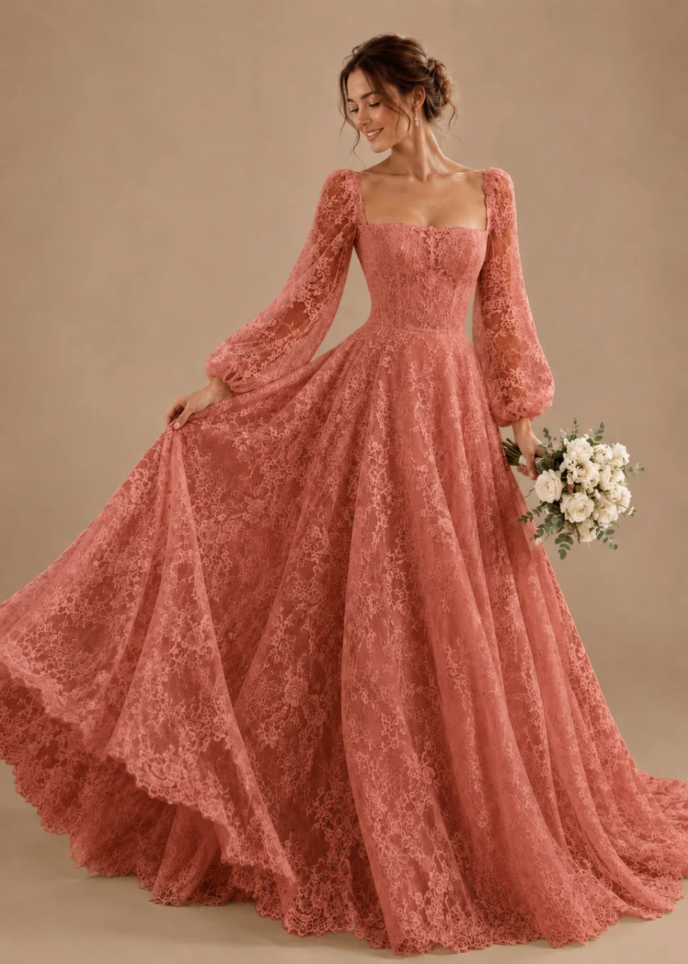 Front view of the dusty rose square-neck A-line gown with all-over floral lace and long bishop sleeves