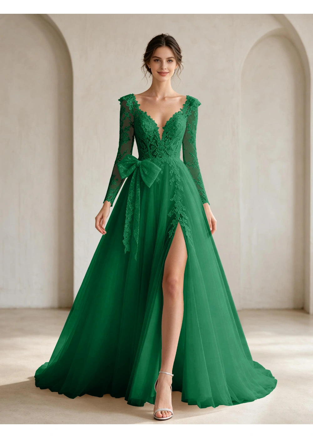 Front view of the emerald green lace front bow slit gown with the same bridal silhouette