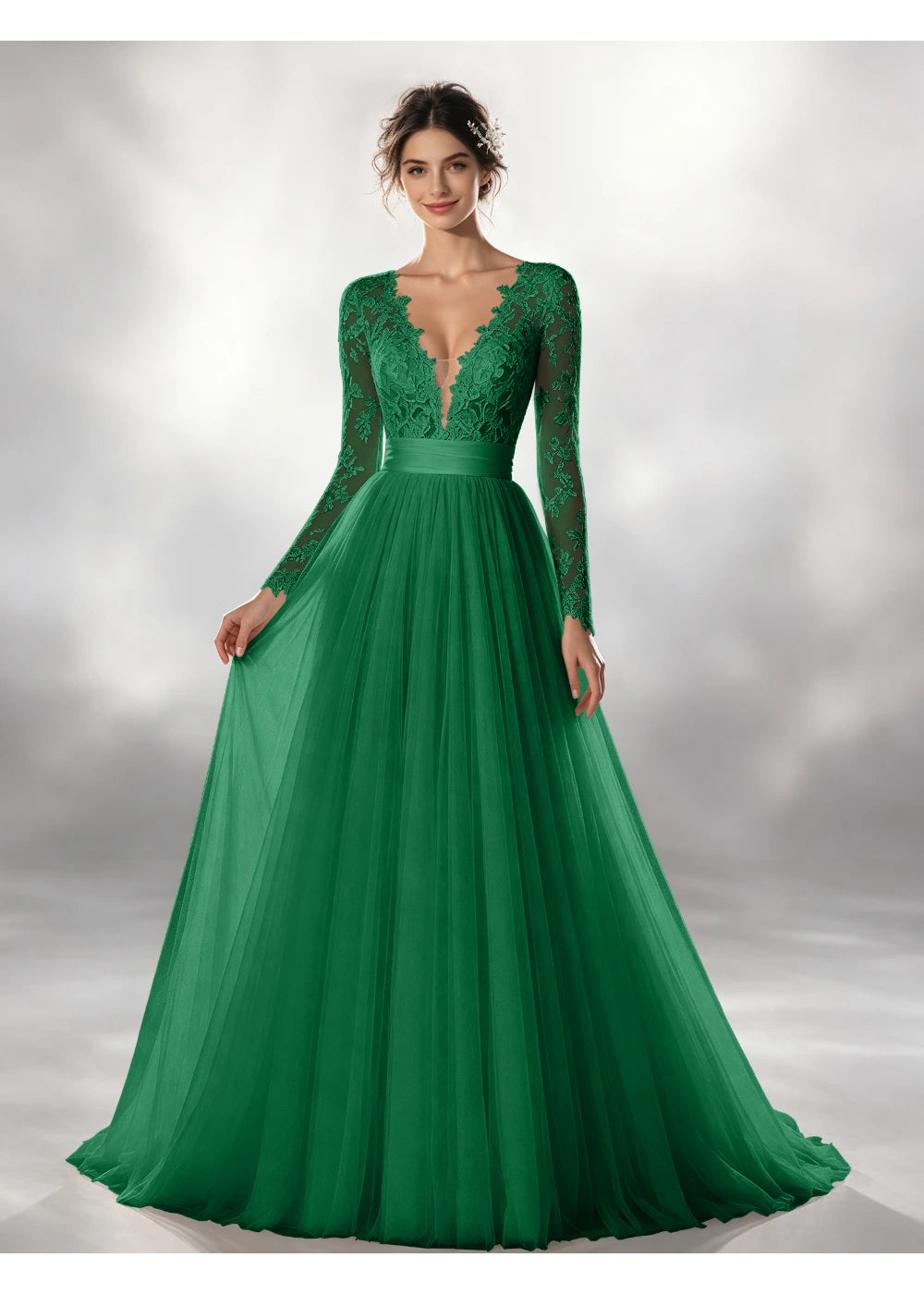 Front view of the emerald green lace waistband tulle gown with the same bridal silhouette