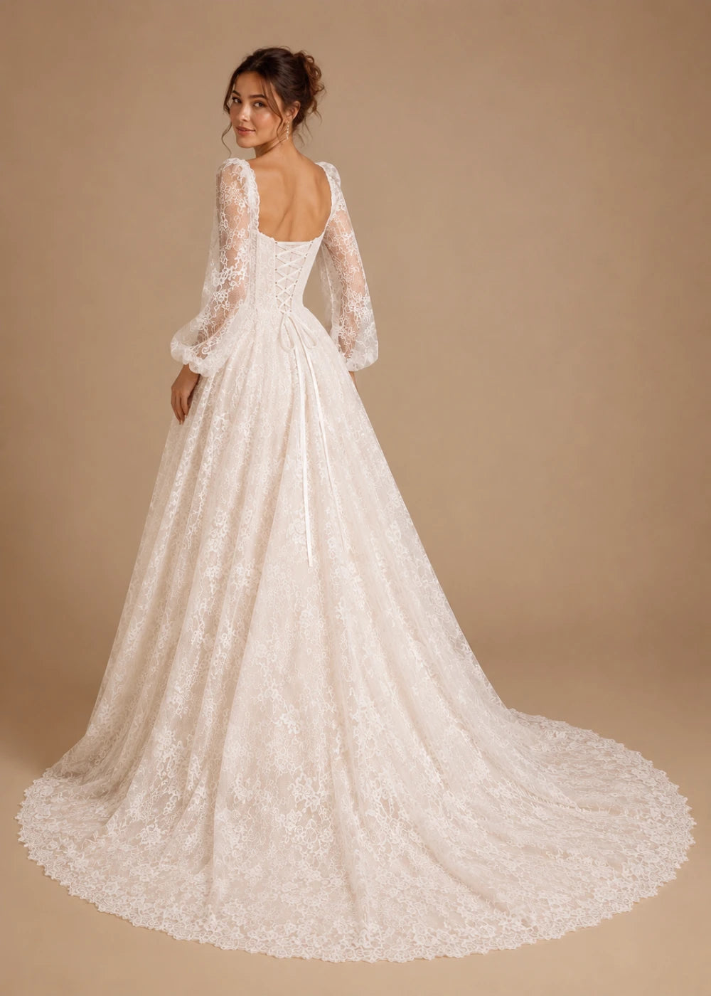 Three-quarter back view of an ivory lace gown showing the low square back, rear waist, skirt, and train