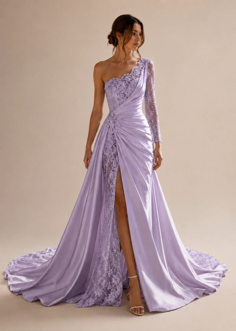 Front view of the lavender one-shoulder fitted gown with one long lace sleeve, a thigh-high slit, and a train