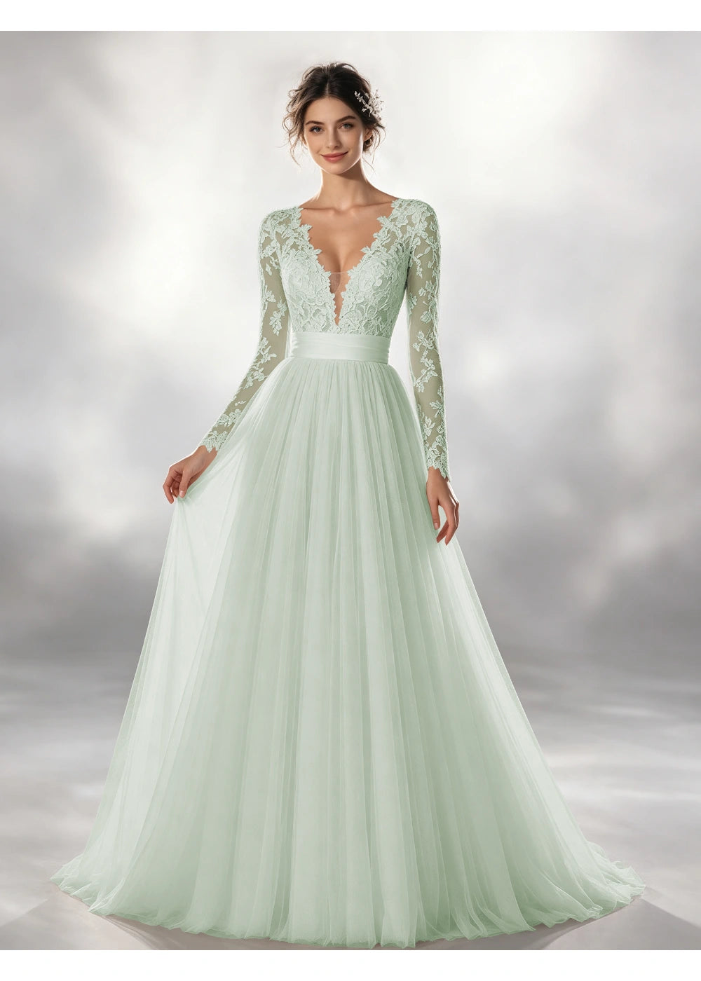 Front view of the sage green lace waistband tulle gown with the same bridal silhouette