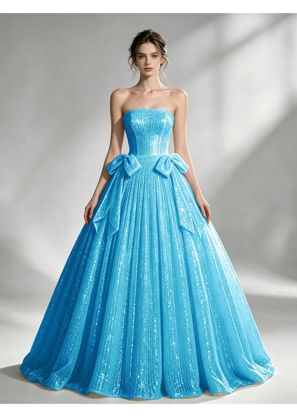 Front view of the turquoise sequin twin bow gown with the same bridal silhouette