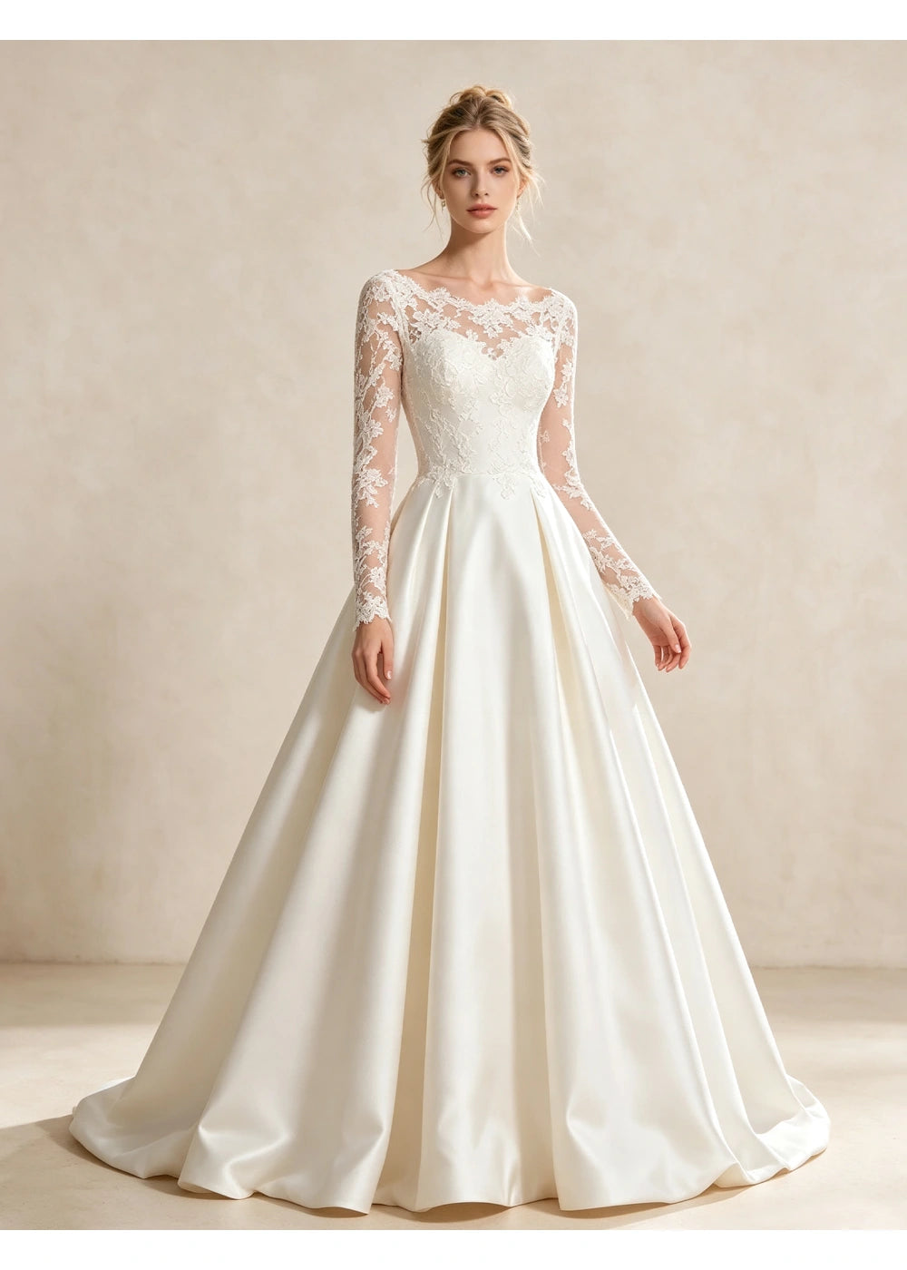 Full-length front view of the white lace bodice and broad satin A-line folds