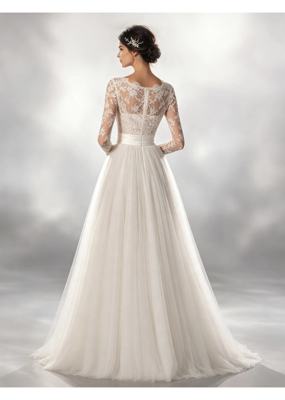 Back view of the white gown showing floral lace above the plain waistband and net skirt