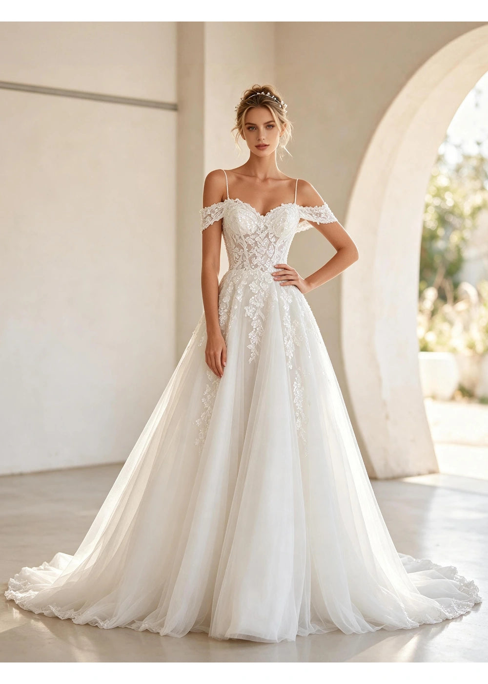 Front view of the white A-line gown with plain lower net layers and a train